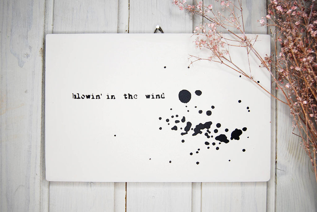 Blowin' in the wind wall sign