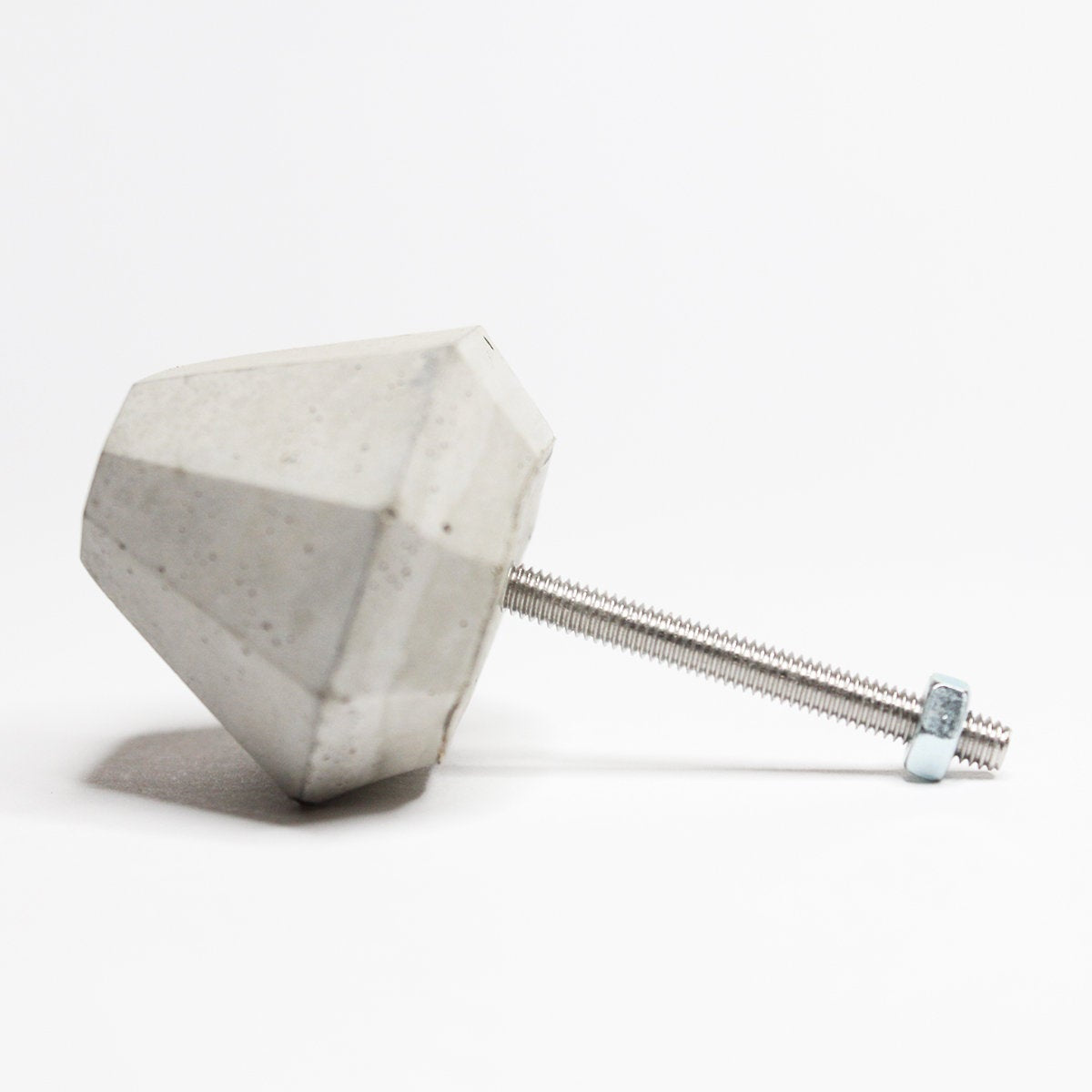 Concrete Cabinet Knob in the shape of a Frustum. Natural or choose colour